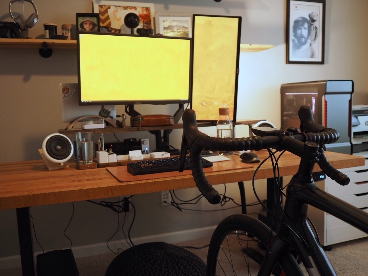 View over the handlebars; forgive the dangly cables under the desk. I coulnd't climb under to tidy them up